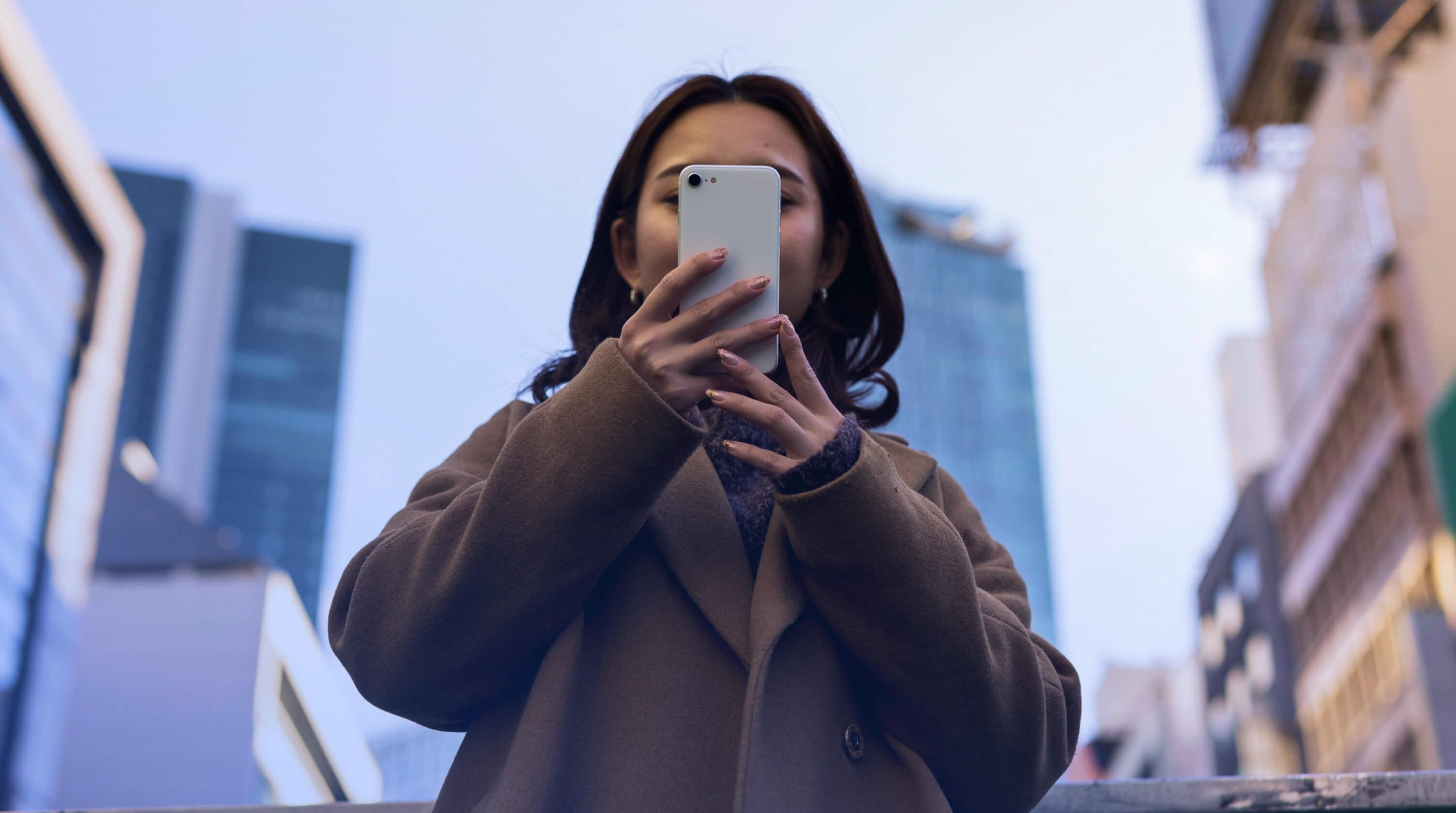 Woman using smartphone technology