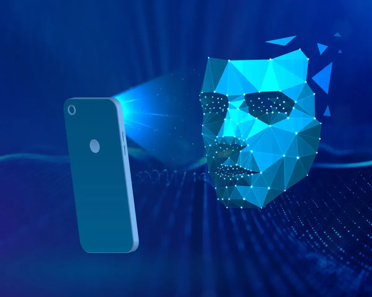 Illustration of a smartphone projecting a light beam onto a polygon mesh of a human face